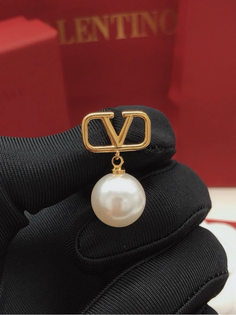 Valentino gold-tone V-logo drop earrings with ivory pearls